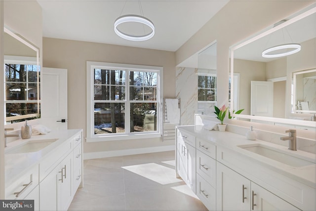 bathroom with vanity and tile patterned floors