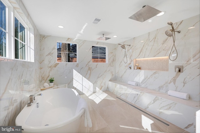 bathroom featuring walk in shower and tile walls