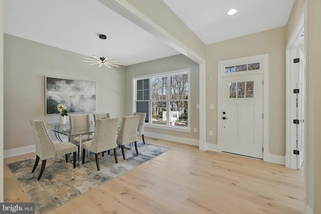 dining space with light wood-type flooring