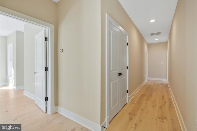 hall featuring light hardwood / wood-style flooring