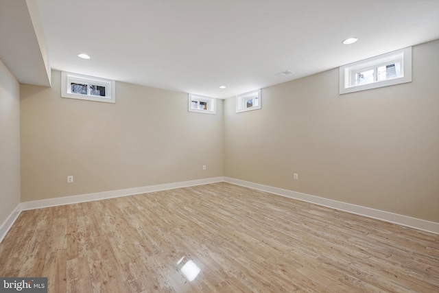 basement featuring light wood-type flooring