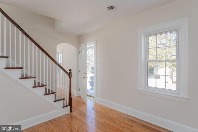 entrance foyer with light hardwood / wood-style floors