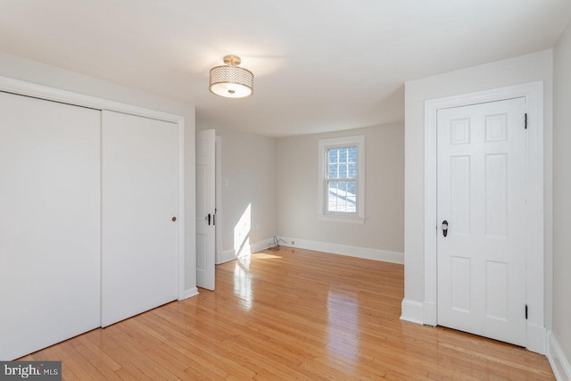 unfurnished bedroom with light hardwood / wood-style floors