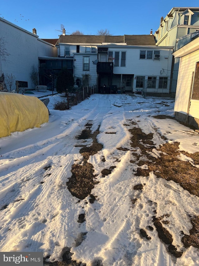 view of snow covered property