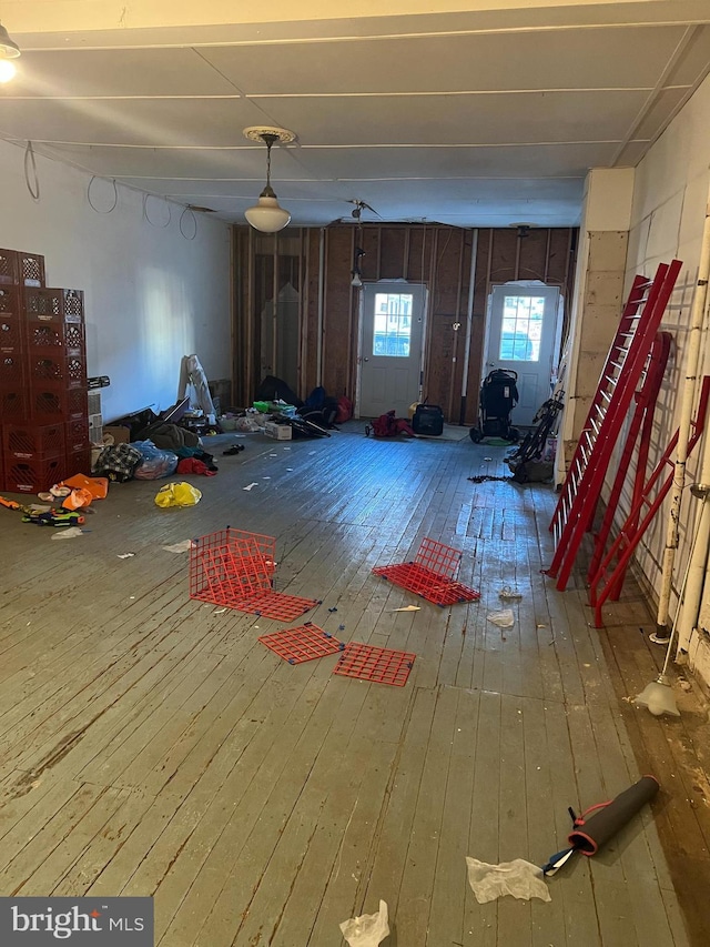 miscellaneous room featuring wood-type flooring