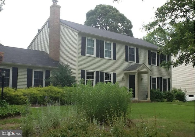 colonial house with a front yard