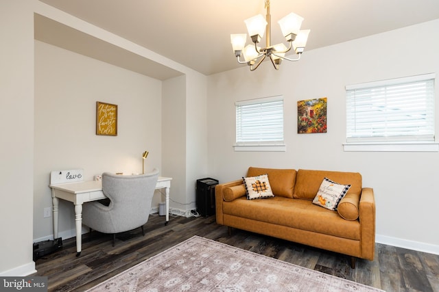 office area featuring dark hardwood / wood-style flooring and a chandelier