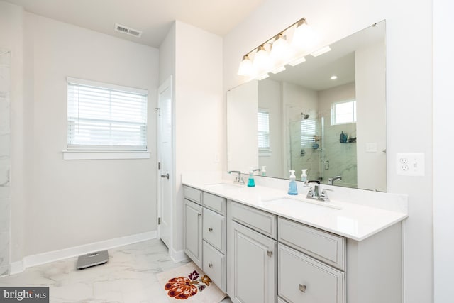 bathroom with vanity and an enclosed shower