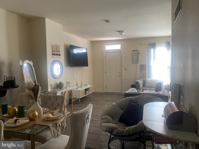 living room featuring dark hardwood / wood-style flooring