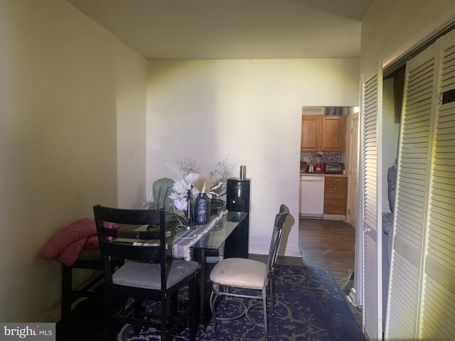 dining room featuring dark hardwood / wood-style flooring