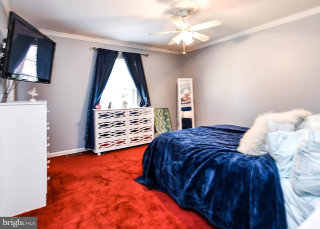 carpeted bedroom featuring crown molding and ceiling fan