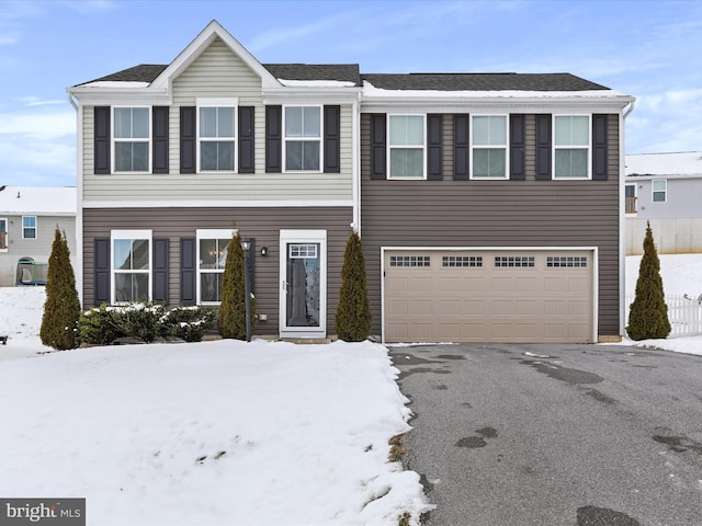 view of front of home with a garage