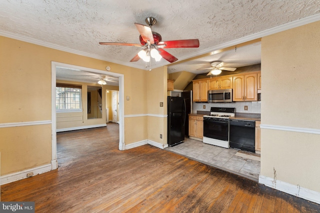 kitchen with tasteful backsplash, a textured ceiling, light hardwood / wood-style flooring, ornamental molding, and black appliances