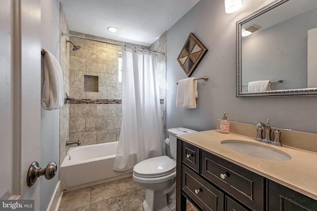 full bathroom with tile patterned flooring, vanity, shower / bath combination with curtain, and toilet