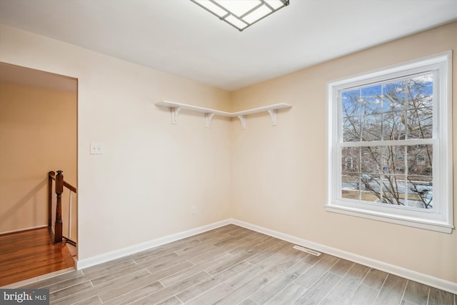 unfurnished room with plenty of natural light