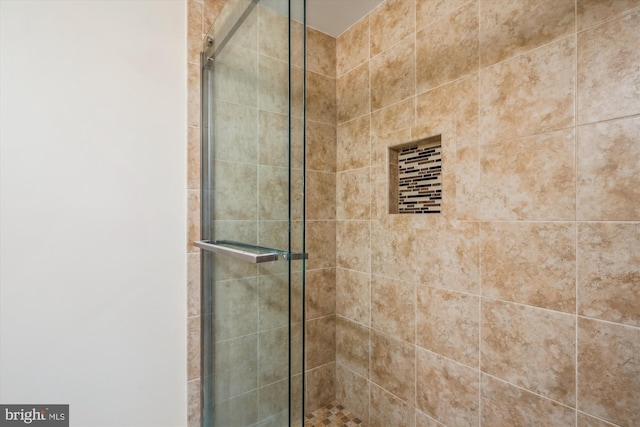 bathroom featuring walk in shower