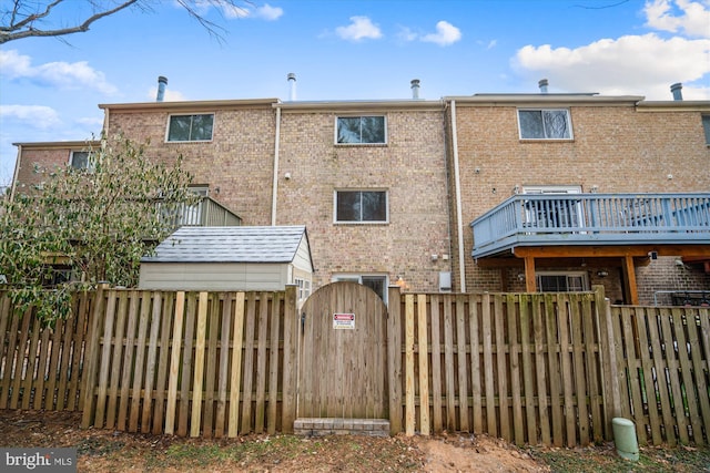 rear view of house with a deck