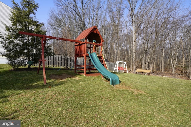 view of playground featuring a yard