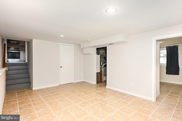 basement with light tile patterned floors