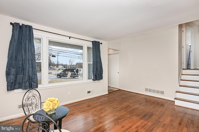 unfurnished room featuring dark hardwood / wood-style floors