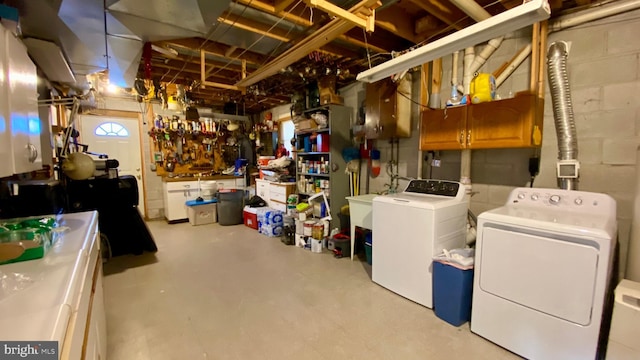 basement with washing machine and dryer