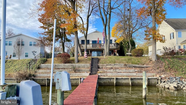 dock area featuring a water view