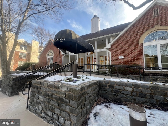 view of snow covered patio