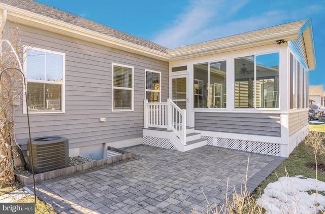 exterior space featuring central AC and a patio