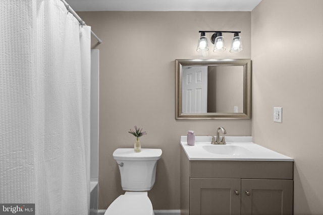 full bathroom with vanity, toilet, and shower / bath combo