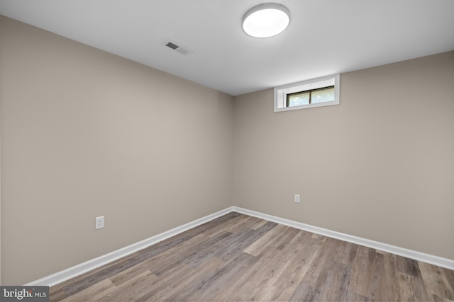 basement featuring light wood-type flooring