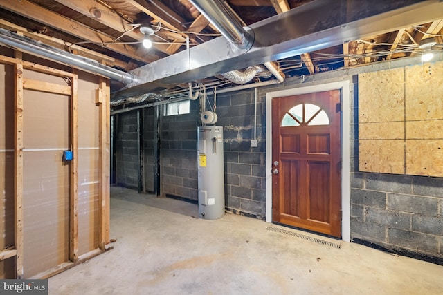 basement featuring water heater