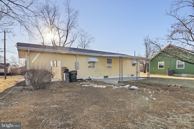 back of property with cooling unit