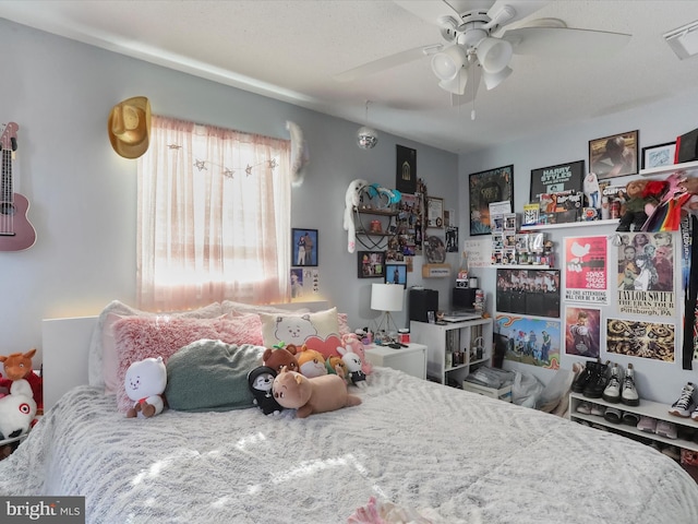 bedroom featuring ceiling fan