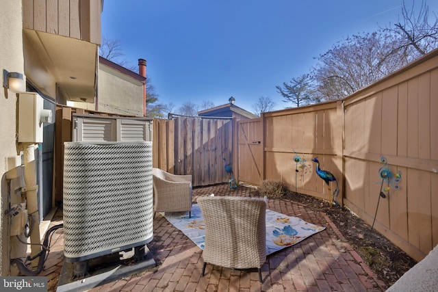 view of patio featuring central AC