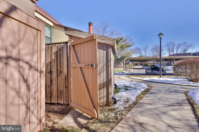 view of outdoor structure with a carport