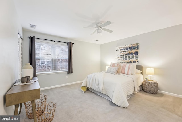 carpeted bedroom with a closet and ceiling fan