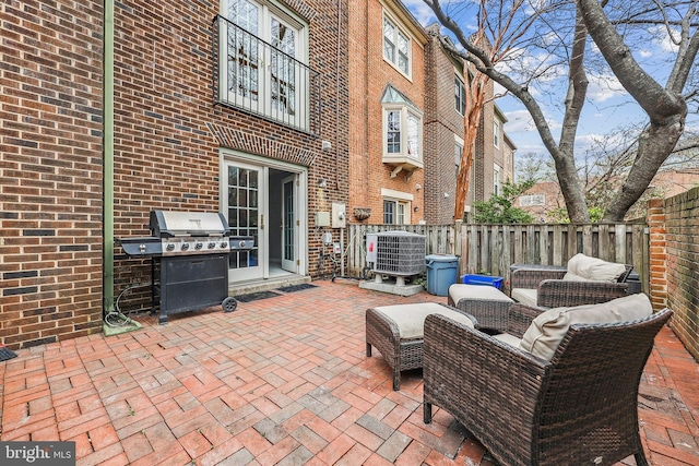 view of patio / terrace featuring grilling area, outdoor lounge area, and central air condition unit