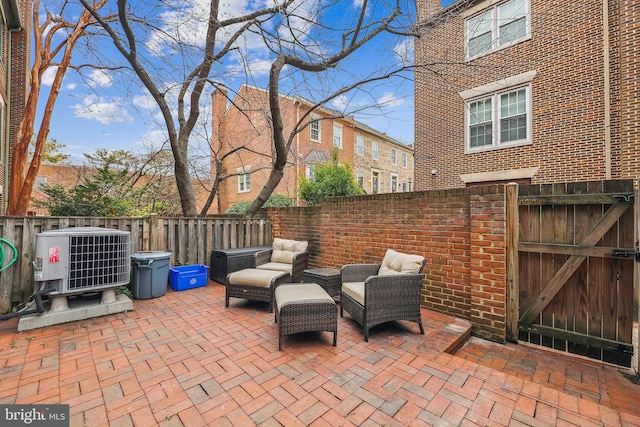 view of patio / terrace with central AC unit