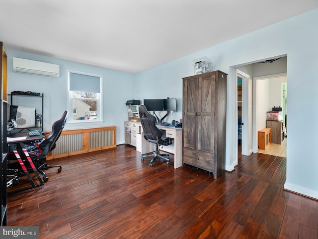 office area featuring dark wood-type flooring and a wall mounted AC