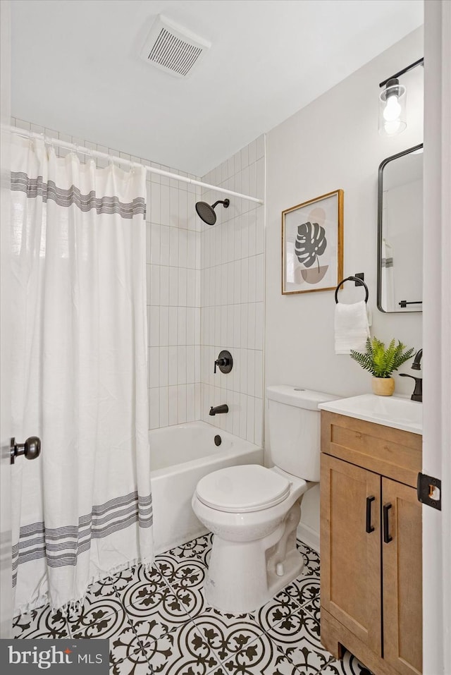 full bathroom with tile patterned flooring, vanity, toilet, and shower / bathtub combination with curtain