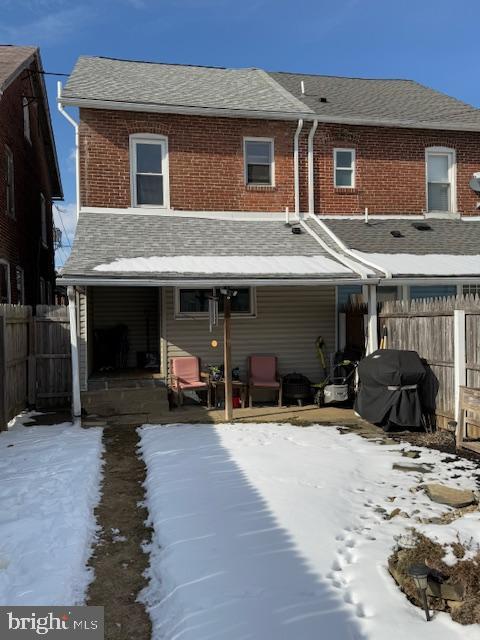 view of snow covered house