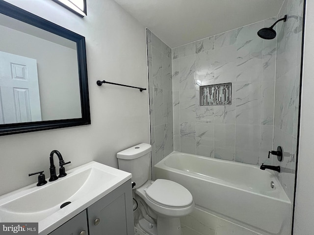 full bathroom featuring vanity, toilet, and tiled shower / bath combo