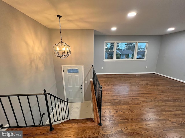 entrance foyer featuring dark hardwood / wood-style floors