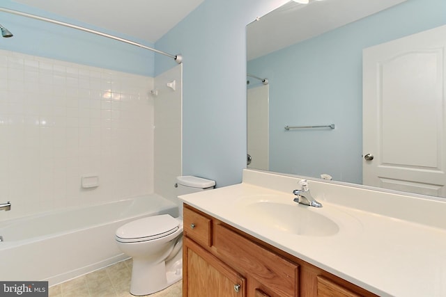 full bathroom with shower / tub combination, vanity, and toilet