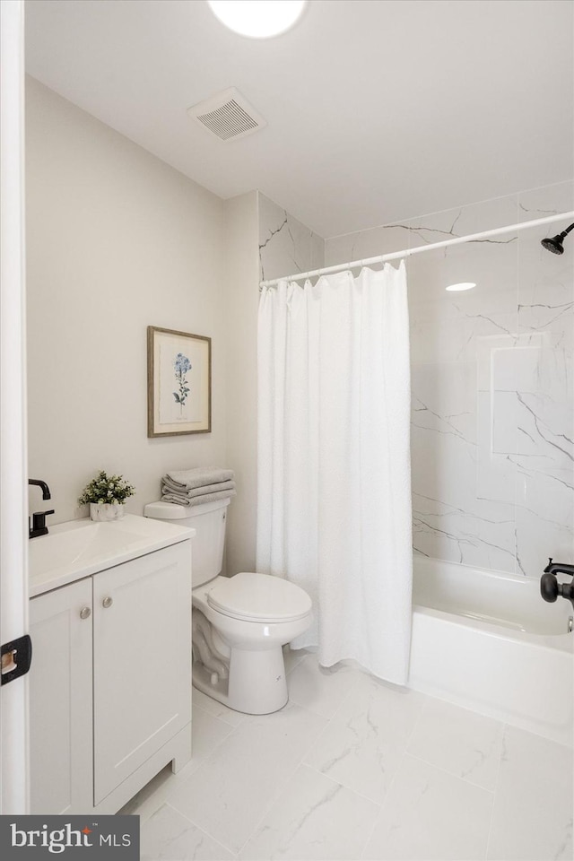 full bathroom featuring vanity, toilet, and shower / bath combo