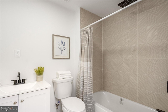 full bathroom featuring vanity, shower / tub combo with curtain, and toilet