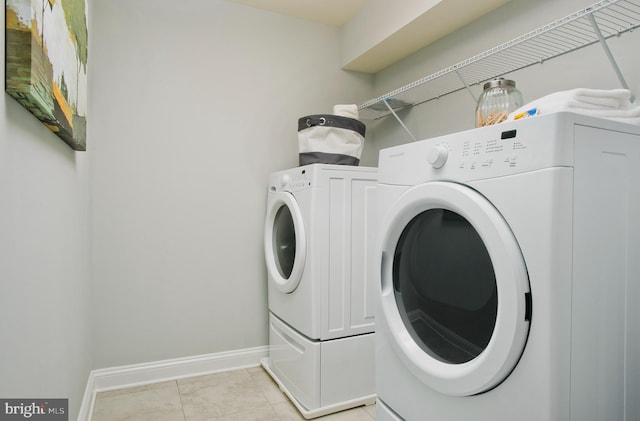 5292 Newport Cir, White Plains, MD 20695 - washroom featuring light tile patterned flooring and independent washer and dryer