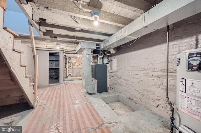 basement with heating unit and water heater