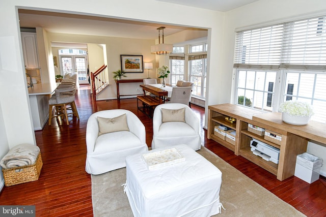 sitting room featuring dark wood-type flooring