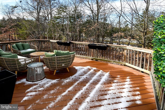 wooden deck featuring an outdoor living space